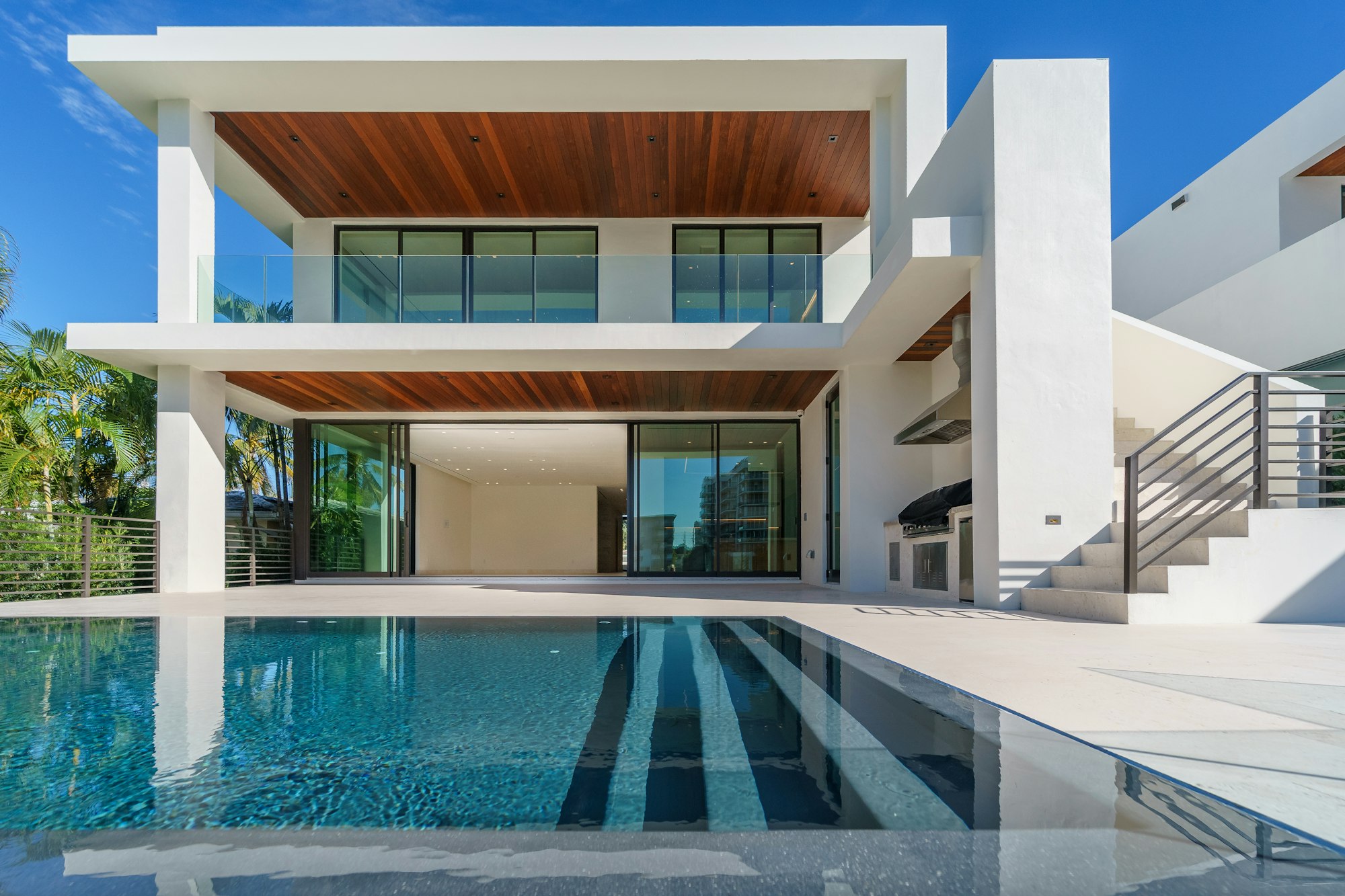 Cordis Villas luxury tropical villa with pool at dusk